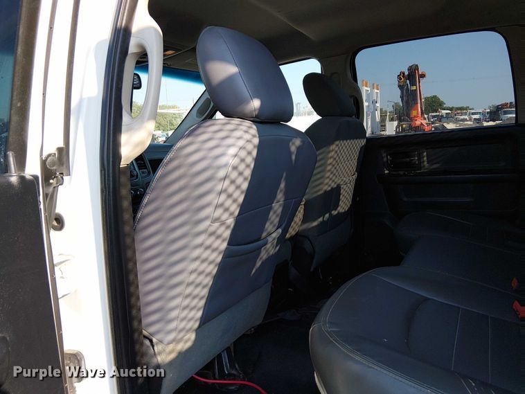 image for item NU9726 2013 RAM 5500 Crew Cab flatbed truck