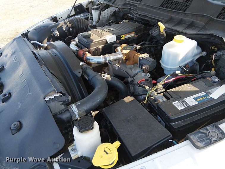 image for item NU9726 2013 RAM 5500 Crew Cab flatbed truck