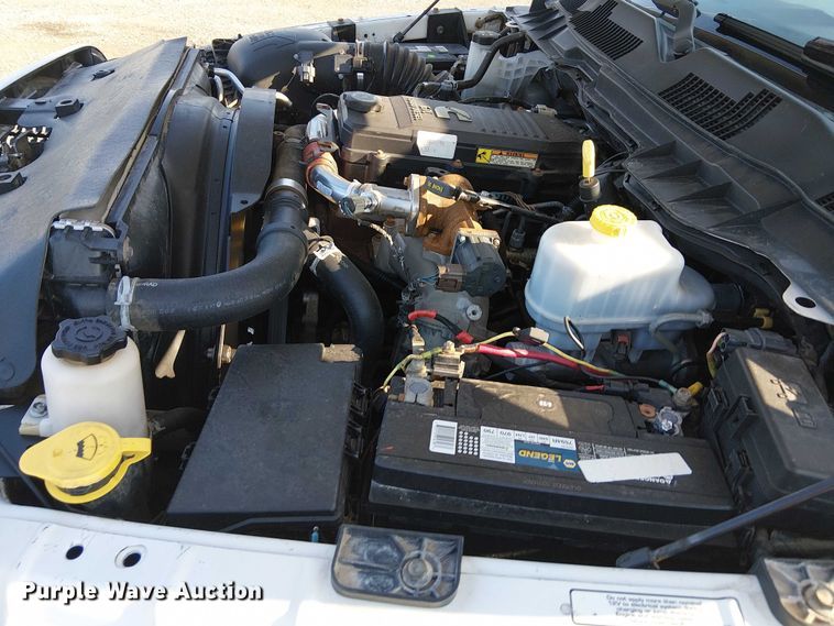 image for item NU9726 2013 RAM 5500 Crew Cab flatbed truck