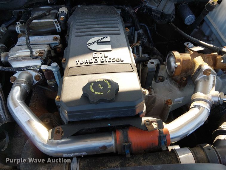 image for item NU9726 2013 RAM 5500 Crew Cab flatbed truck