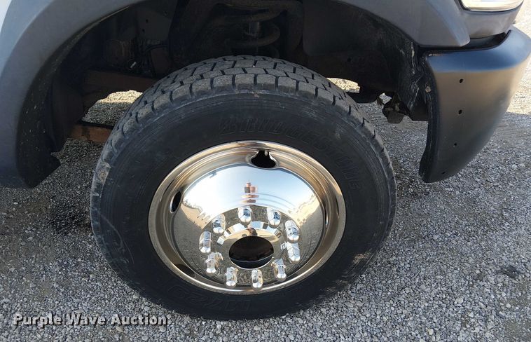 image for item NU9726 2013 RAM 5500 Crew Cab flatbed truck