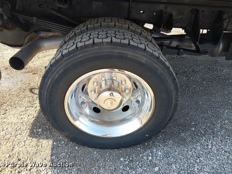 image for item NU9726 2013 RAM 5500 Crew Cab flatbed truck