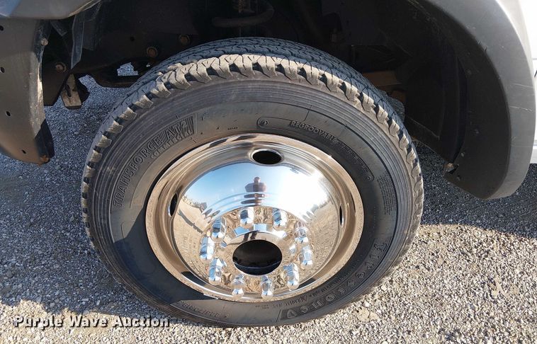 image for item NU9726 2013 RAM 5500 Crew Cab flatbed truck