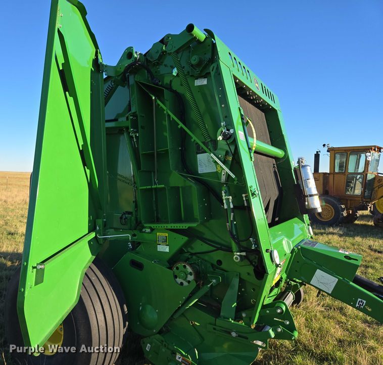 image for item DY1361 2021 John Deere 560M round baler