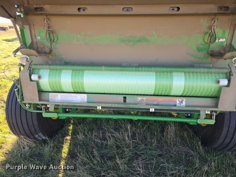 image for item DY1361 2021 John Deere 560M round baler
