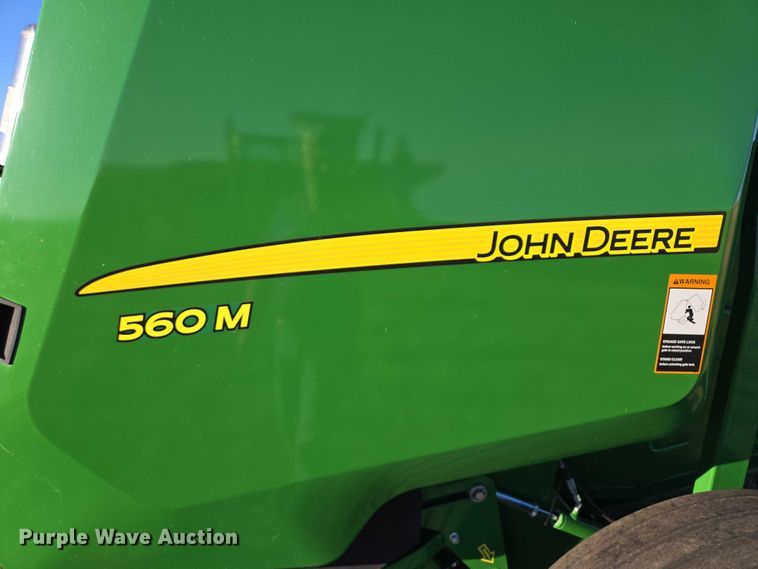 image for item DY1361 2021 John Deere 560M round baler