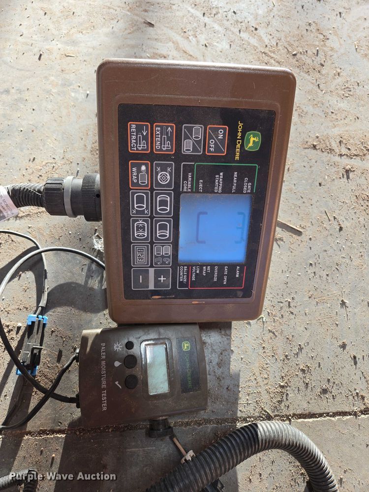 image for item DY1361 2021 John Deere 560M round baler