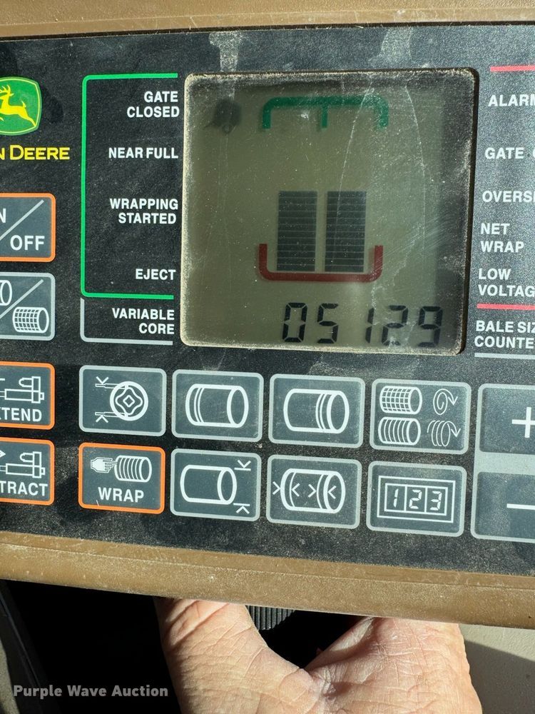 image for item DY1361 2021 John Deere 560M round baler