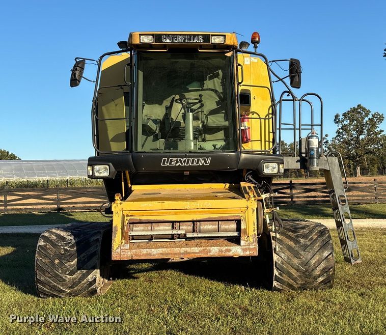 image for item ED2302 1999 Caterpillar Lexion 465 RWA combine