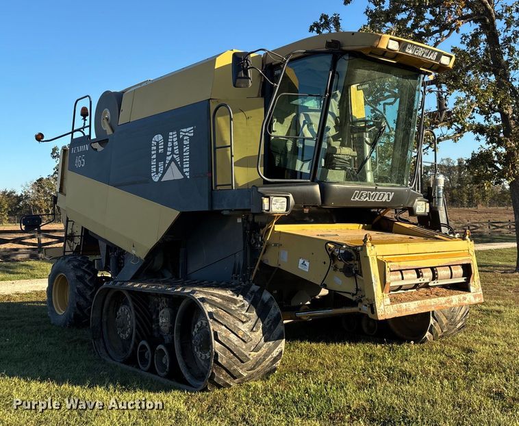 image for item ED2302 1999 Caterpillar Lexion 465 RWA combine