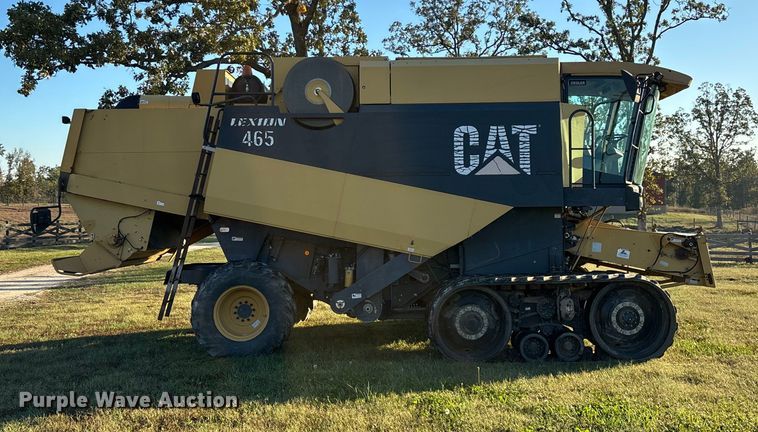 image for item ED2302 1999 Caterpillar Lexion 465 RWA combine