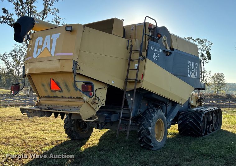 image for item ED2302 1999 Caterpillar Lexion 465 RWA combine
