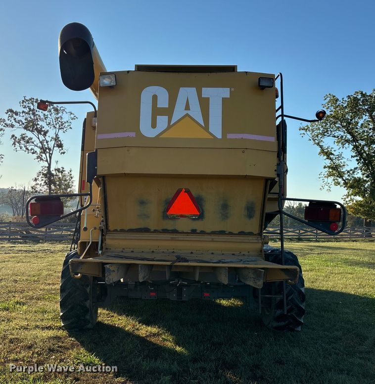 image for item ED2302 1999 Caterpillar Lexion 465 RWA combine
