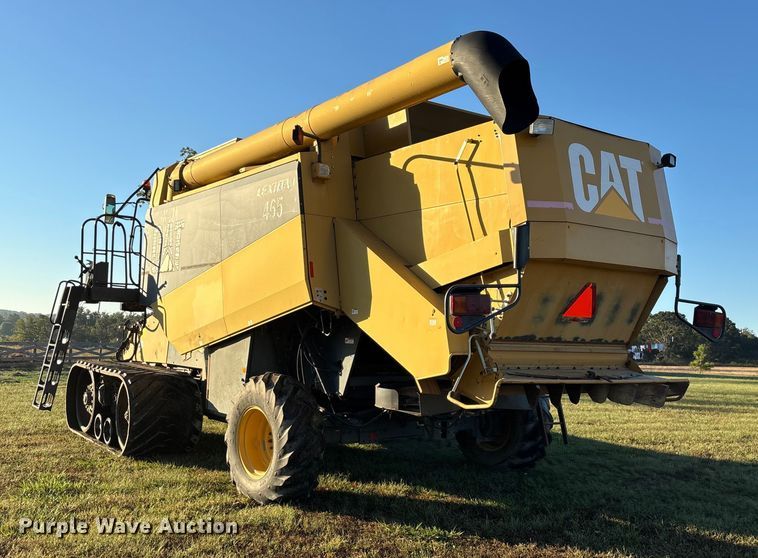 image for item ED2302 1999 Caterpillar Lexion 465 RWA combine