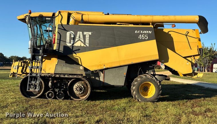 image for item ED2302 1999 Caterpillar Lexion 465 RWA combine