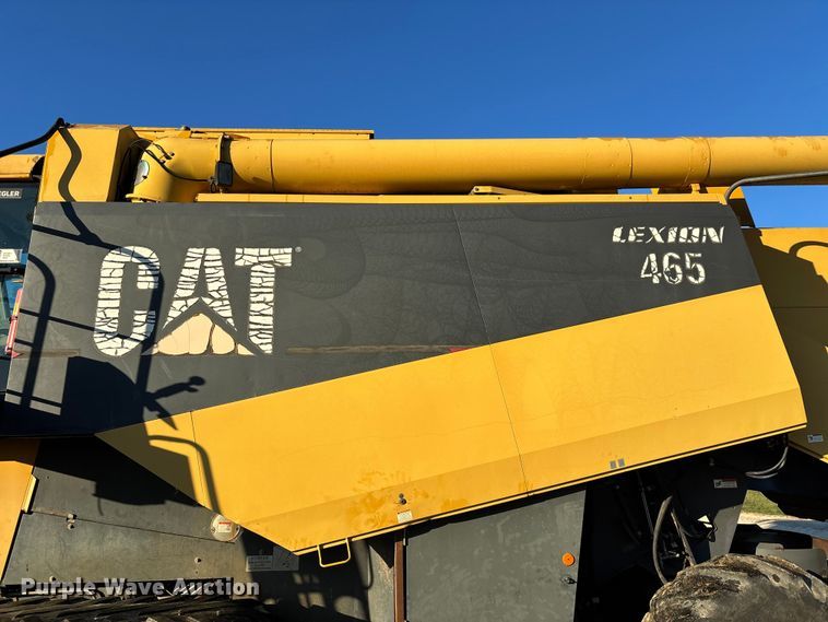 image for item ED2302 1999 Caterpillar Lexion 465 RWA combine