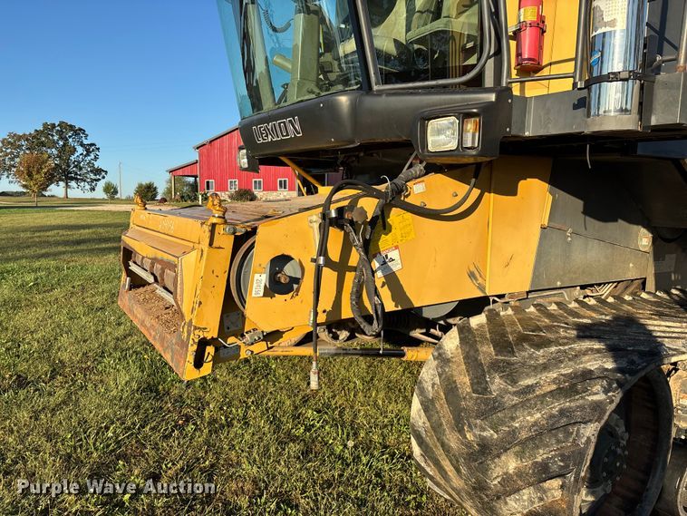 image for item ED2302 1999 Caterpillar Lexion 465 RWA combine