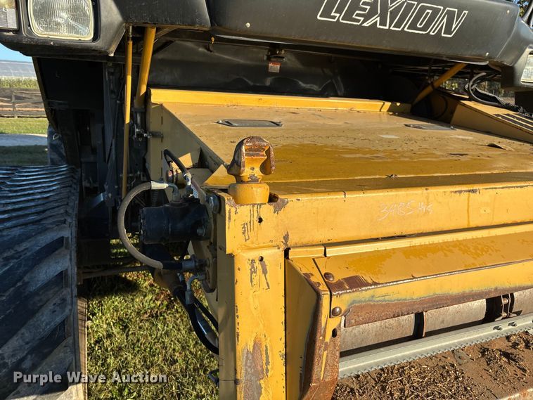 image for item ED2302 1999 Caterpillar Lexion 465 RWA combine