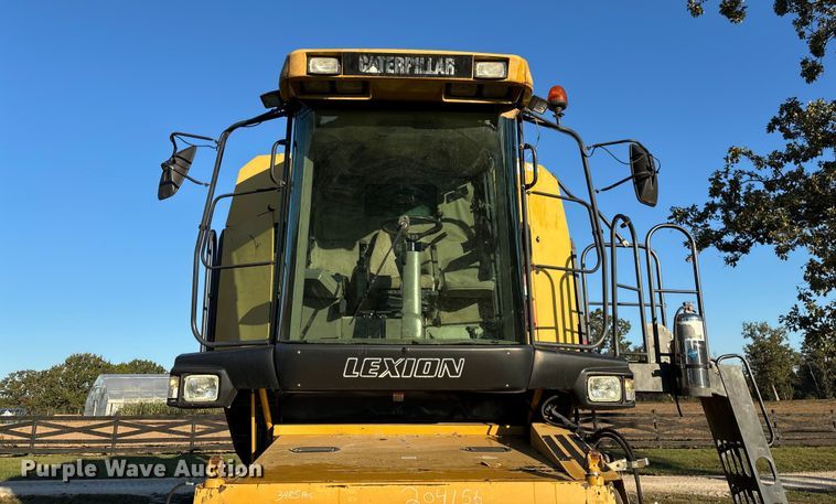 image for item ED2302 1999 Caterpillar Lexion 465 RWA combine