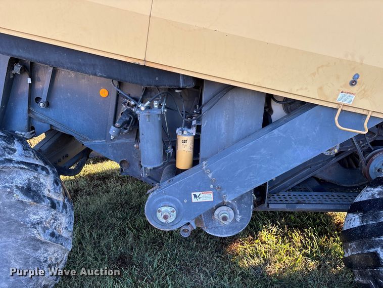 image for item ED2302 1999 Caterpillar Lexion 465 RWA combine