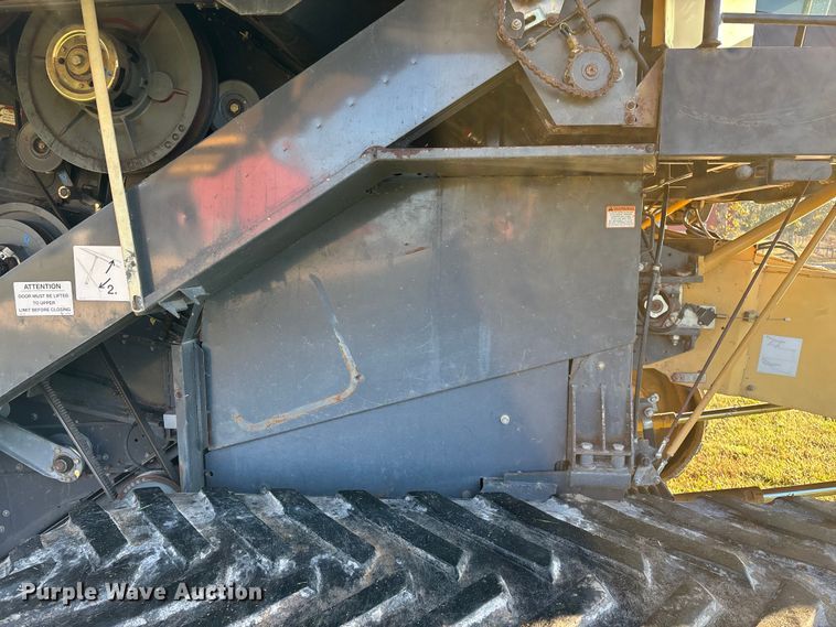image for item ED2302 1999 Caterpillar Lexion 465 RWA combine