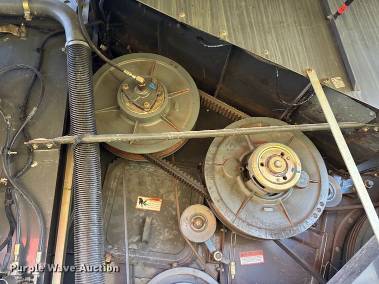 image for item ED2302 1999 Caterpillar Lexion 465 RWA combine