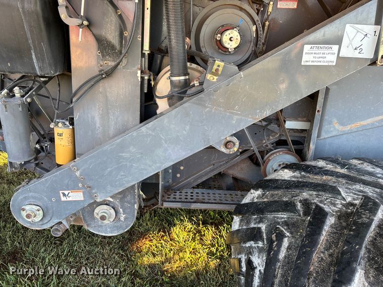 image for item ED2302 1999 Caterpillar Lexion 465 RWA combine