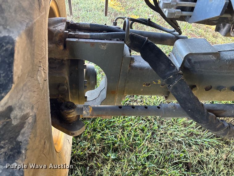 image for item ED2302 1999 Caterpillar Lexion 465 RWA combine