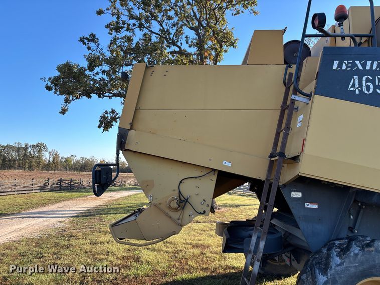 image for item ED2302 1999 Caterpillar Lexion 465 RWA combine