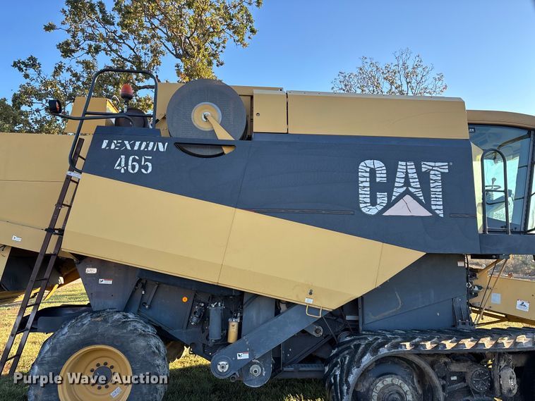 image for item ED2302 1999 Caterpillar Lexion 465 RWA combine
