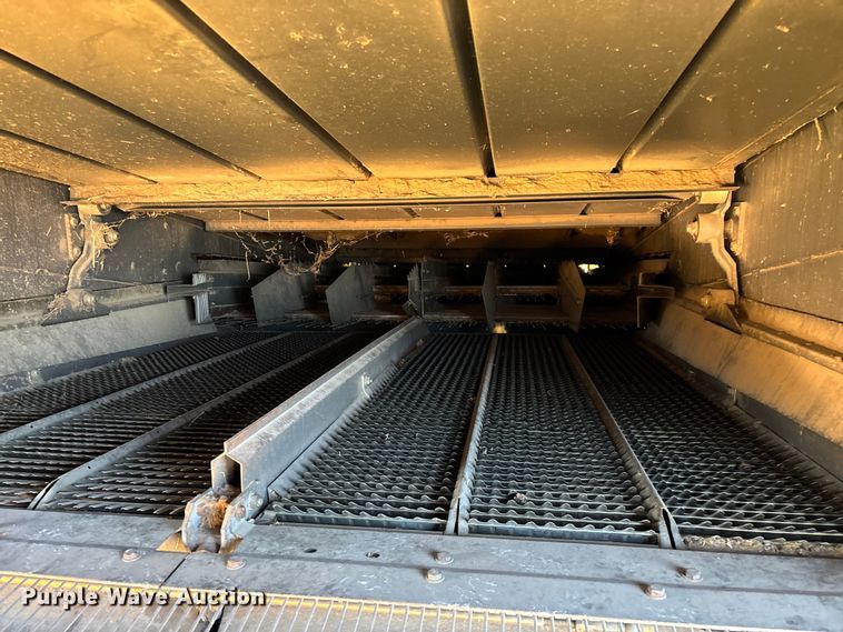 image for item ED2302 1999 Caterpillar Lexion 465 RWA combine