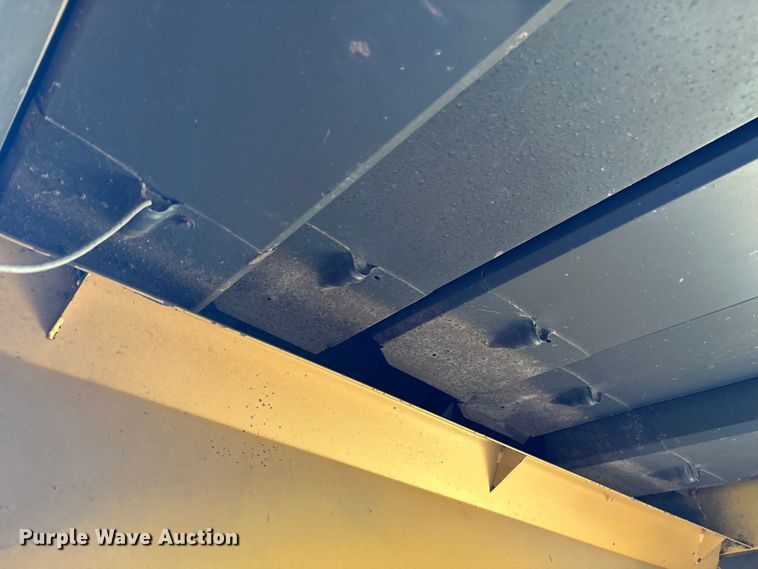 image for item ED2302 1999 Caterpillar Lexion 465 RWA combine