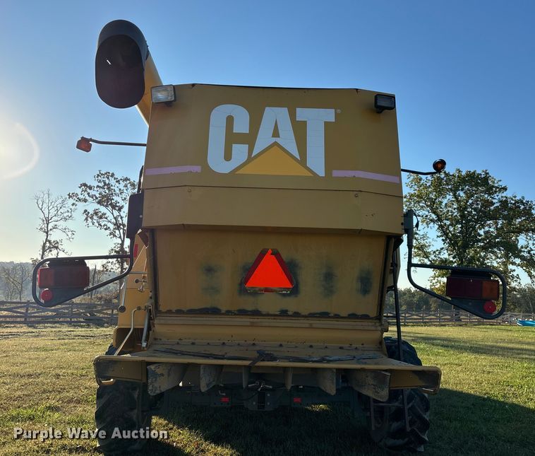 image for item ED2302 1999 Caterpillar Lexion 465 RWA combine
