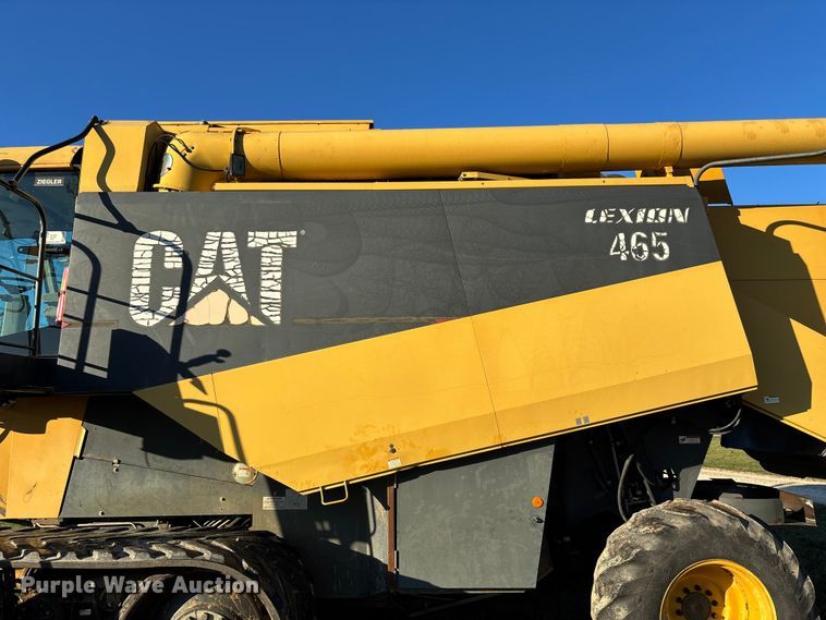 image for item ED2302 1999 Caterpillar Lexion 465 RWA combine