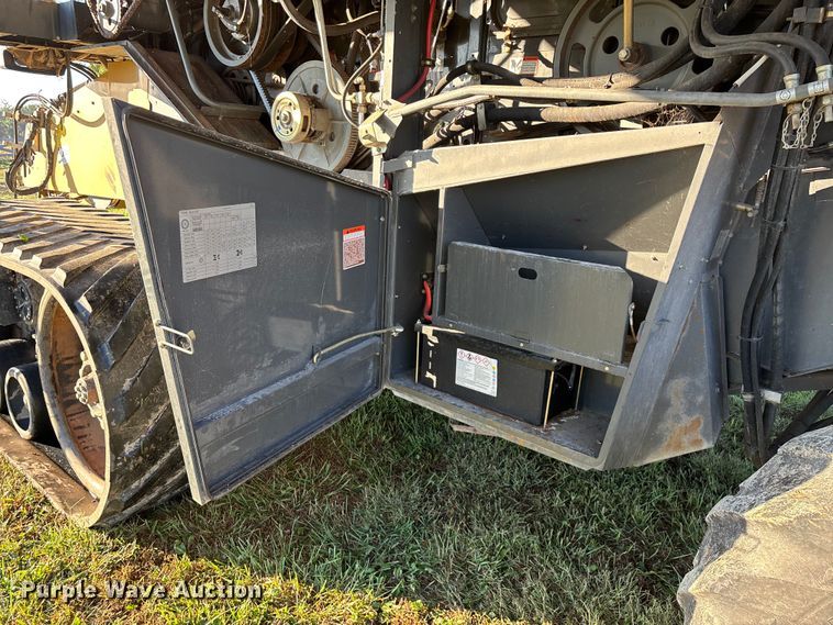 image for item ED2302 1999 Caterpillar Lexion 465 RWA combine