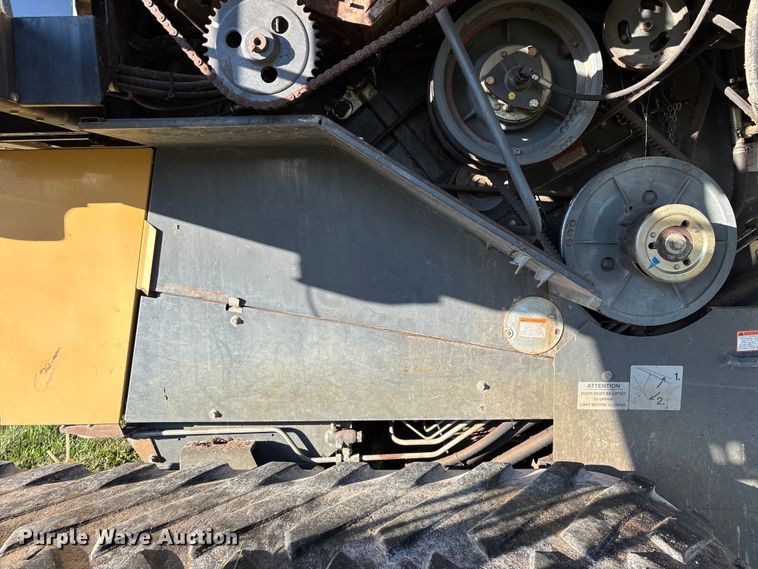 image for item ED2302 1999 Caterpillar Lexion 465 RWA combine