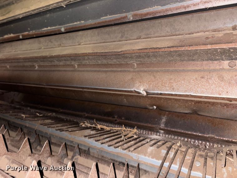 image for item ED2302 1999 Caterpillar Lexion 465 RWA combine