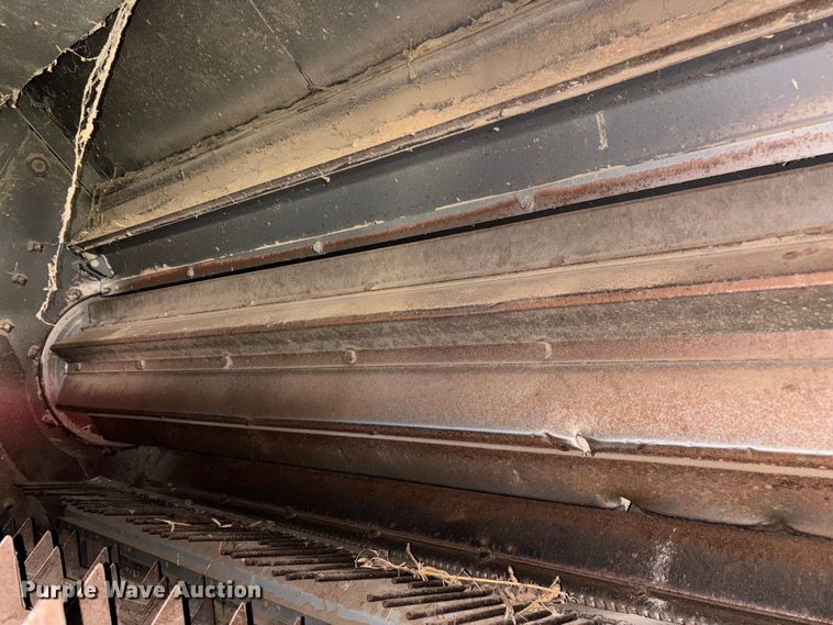 image for item ED2302 1999 Caterpillar Lexion 465 RWA combine