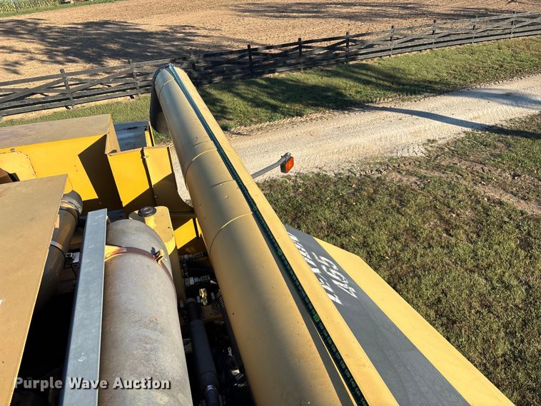 image for item ED2302 1999 Caterpillar Lexion 465 RWA combine