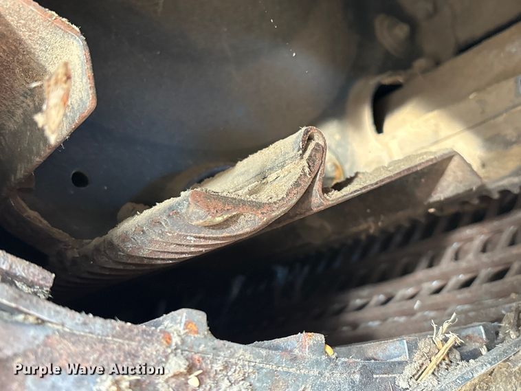 image for item ED2302 1999 Caterpillar Lexion 465 RWA combine