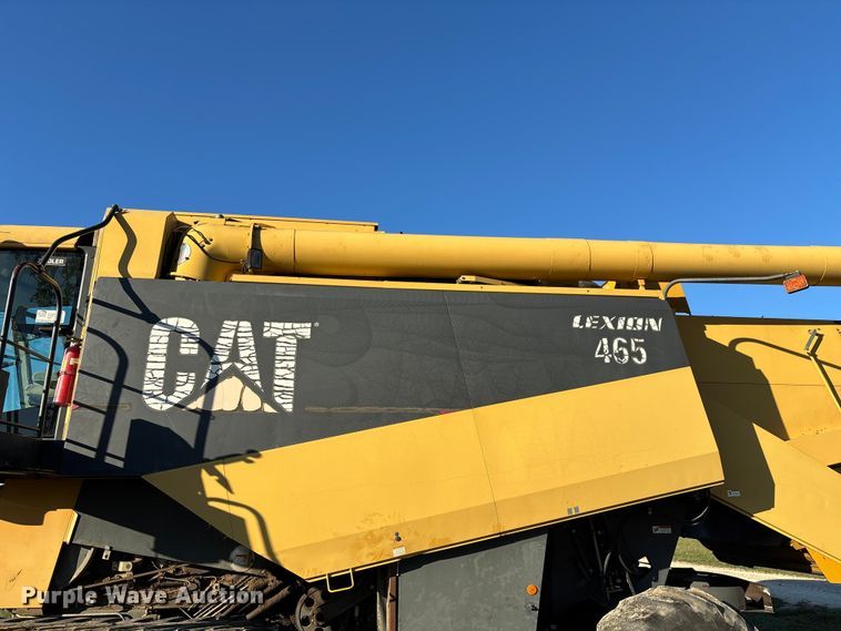 image for item ED2302 1999 Caterpillar Lexion 465 RWA combine