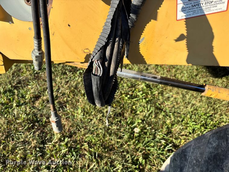 image for item ED2302 1999 Caterpillar Lexion 465 RWA combine