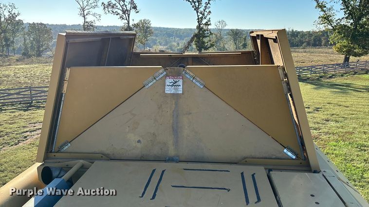 image for item ED2302 1999 Caterpillar Lexion 465 RWA combine