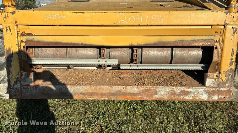 image for item ED2302 1999 Caterpillar Lexion 465 RWA combine