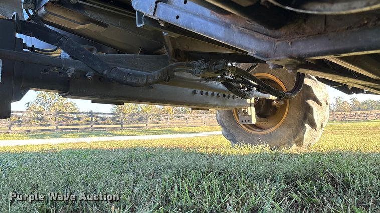 image for item ED2302 1999 Caterpillar Lexion 465 RWA combine