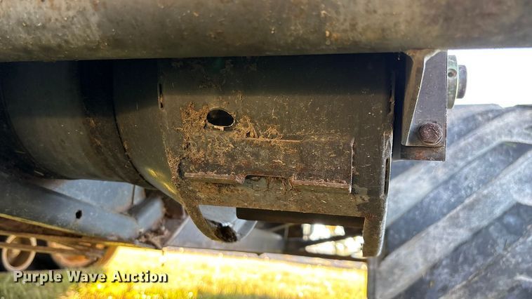 image for item ED2302 1999 Caterpillar Lexion 465 RWA combine