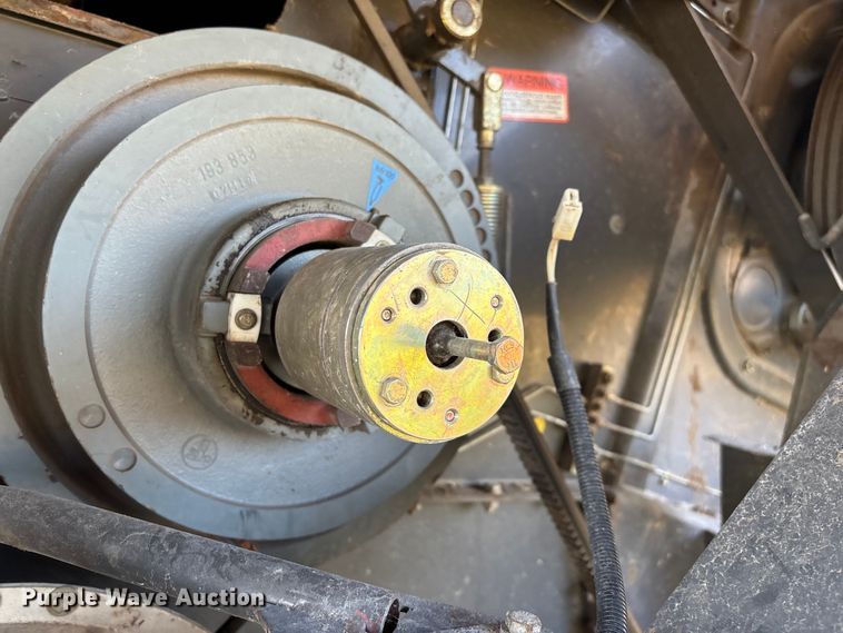 image for item ED2302 1999 Caterpillar Lexion 465 RWA combine