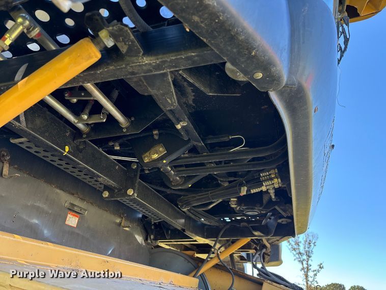 image for item ED2302 1999 Caterpillar Lexion 465 RWA combine