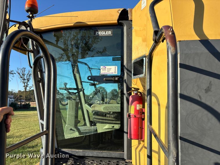 image for item ED2302 1999 Caterpillar Lexion 465 RWA combine