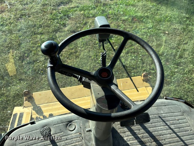 image for item ED2302 1999 Caterpillar Lexion 465 RWA combine